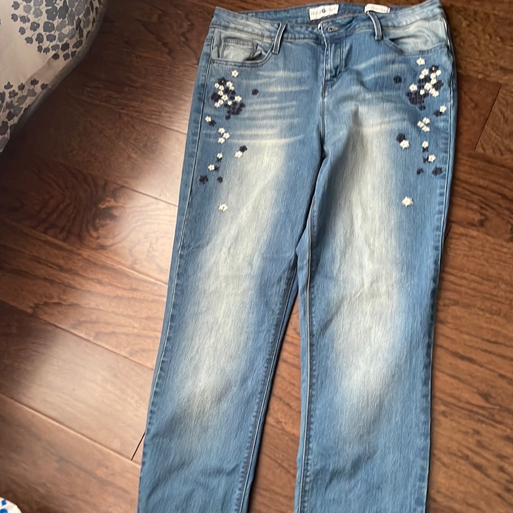 Black Daisy | women’s straight leg denim jeans with floral patterns on the side